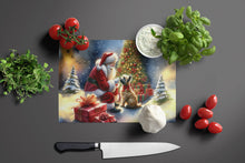 Load image into Gallery viewer, Cairn Terrier and Santa Claus Glass Cutting Boards – Durable, Decorative Kitchen Art
