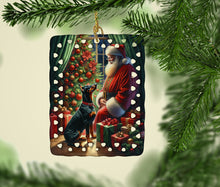 Load image into Gallery viewer, Doberman Pinscher and Santa Claus Porcelain Ornament