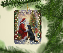 Load image into Gallery viewer, Flat-Coated Retriever and Santa Claus Porcelain Ornament