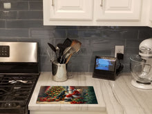 Load image into Gallery viewer, Gordon Setter and Santa Claus Glass Cutting Boards – Durable, Decorative Kitchen Art