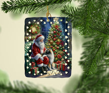 Load image into Gallery viewer, Keeshond and Santa Claus Porcelain Ornament