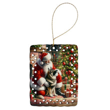 Load image into Gallery viewer, Norwegian Elkhound and Santa Claus Porcelain Ornament
