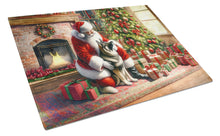Load image into Gallery viewer, Norwegian Elkhound and Santa Claus Glass Cutting Boards – Durable, Decorative Kitchen Art