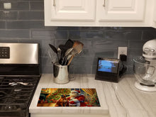 Load image into Gallery viewer, Rhodesian Ridgeback and Santa Claus Glass Cutting Boards – Durable, Decorative Kitchen Art