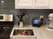 Load image into Gallery viewer, Scottish Terrier and Santa Claus Glass Cutting Boards – Durable, Decorative Kitchen Art