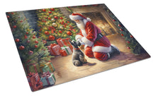 Load image into Gallery viewer, Scottish Terrier and Santa Claus Glass Cutting Boards – Durable, Decorative Kitchen Art