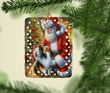 Load image into Gallery viewer, Sheltie and Santa Claus Porcelain Ornament