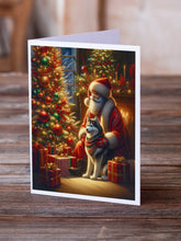 Load image into Gallery viewer, Siberian Husky and Santa Claus Greeting Cards - Blank Note Cards – 8-Pack of Artist-Designed Cards with Envelopes