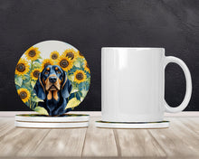 Load image into Gallery viewer, Black and Tan Coonhound in Sunflowers Large Sandstone Coasters Pack of 4