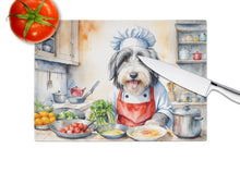 Load image into Gallery viewer, Bearded Collie The Chef Glass Cutting Boards – Durable, Decorative Kitchen Art