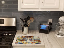 Load image into Gallery viewer, Decorating Easter Akita Glass Cutting Boards – Durable, Decorative Kitchen Art