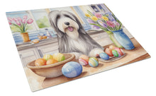 Load image into Gallery viewer, Decorating Easter Bearded Collie Glass Cutting Boards – Durable, Decorative Kitchen Art
