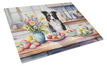Load image into Gallery viewer, Decorating Easter Border Collie Glass Cutting Boards – Durable, Decorative Kitchen Art