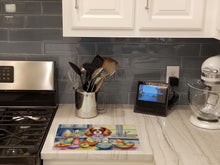 Load image into Gallery viewer, Decorating Easter Cavalier Spaniel Glass Cutting Boards – Durable, Decorative Kitchen Art