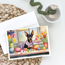 Load image into Gallery viewer, Decorating Easter Miniature Pinscher Greeting Cards - Blank Note Cards – 8-Pack of Artist-Designed Cards with Envelopes
