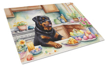 Load image into Gallery viewer, Decorating Easter Rottweiler Glass Cutting Boards – Durable, Decorative Kitchen Art