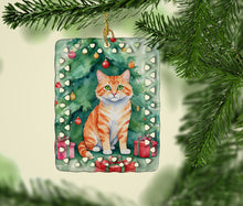 Load image into Gallery viewer, Cheetoh Cat By the Christmas Tree Porcelain Ornament