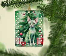 Load image into Gallery viewer, Devon Rex Cat By the Christmas Tree Porcelain Ornament