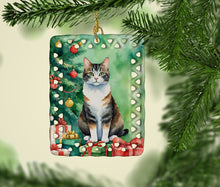 Load image into Gallery viewer, Manx Cat By the Christmas Tree Porcelain Ornament