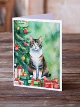 Load image into Gallery viewer, Manx Cat By the Christmas Tree Greeting Cards - Blank Note Cards – 8-Pack of Artist-Designed Cards with Envelopes