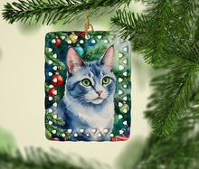 Load image into Gallery viewer, Ojos Azules Cat By the Christmas Tree Porcelain Ornament