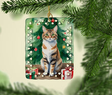 Load image into Gallery viewer, Owyhee Bob Cat By the Christmas Tree Porcelain Ornament
