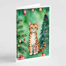 Load image into Gallery viewer, Safari Cat By the Christmas Tree Greeting Cards - Blank Note Cards – 8-Pack of Artist-Designed Cards with Envelopes