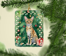 Load image into Gallery viewer, Savannah Cat By the Christmas Tree Porcelain Ornament