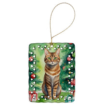 Load image into Gallery viewer, Sokoke Cat By the Christmas Tree Porcelain Ornament