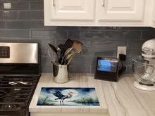 Load image into Gallery viewer, Blue Heron Under the Moonlight Glass Cutting Boards – Durable, Decorative Kitchen Art