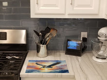 Load image into Gallery viewer, Pelican Fyling at Sunrise Glass Cutting Boards – Durable, Decorative Kitchen Art