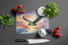 Load image into Gallery viewer, Pelican Fyling at Sunrise Glass Cutting Boards – Durable, Decorative Kitchen Art