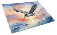 Load image into Gallery viewer, Pelican Fyling at Sunrise Glass Cutting Boards – Durable, Decorative Kitchen Art