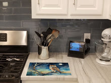 Load image into Gallery viewer, Owl Perched in Coastal Tree Glass Cutting Boards – Durable, Decorative Kitchen Art