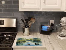 Load image into Gallery viewer, Ducks by the Pond Glass Cutting Boards – Durable, Decorative Kitchen Art