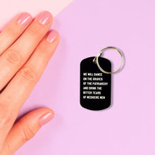 Load image into Gallery viewer, Dance on the Graves of the Patriarchy Dog Tag Keychain in Black, Laser Engraved