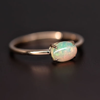 14K Yellow Gold Engagement Ring featuring an Oval Ethiopian Opal