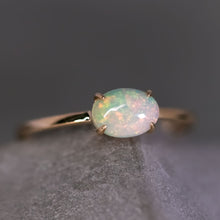 Load image into Gallery viewer, 14K Yellow Gold Engagement Ring featuring an Oval Ethiopian Opal