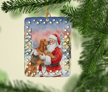 Load image into Gallery viewer, Bloodhound with Santa Claus Porcelain Ornament