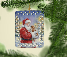 Load image into Gallery viewer, Cavalier Spaniel with Santa Claus Porcelain Ornament