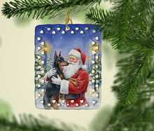Load image into Gallery viewer, Doberman Pinscher with Santa Claus Porcelain Ornament