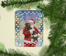 Load image into Gallery viewer, Chocolate Labrador Retriever with Santa Claus Porcelain Ornament