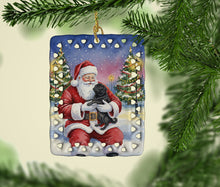 Load image into Gallery viewer, Black Pug with Santa Claus Porcelain Ornament