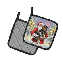 Load image into Gallery viewer, Rottweiler with Santa Claus Pair of Pot Holders