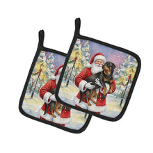 Load image into Gallery viewer, Rottweiler with Santa Claus Pair of Pot Holders