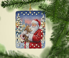 Load image into Gallery viewer, Ticked Tabby Brown Cat with Santa Claus Porcelain Ornament