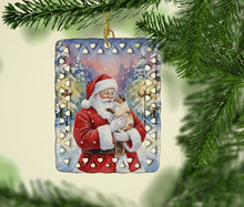 Load image into Gallery viewer, Tortie Point Cat with Santa Claus Porcelain Ornament