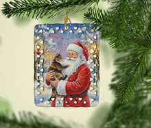 Load image into Gallery viewer, Tortoiseshell Cat with Santa Claus Porcelain Ornament