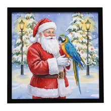 Load image into Gallery viewer, Blue and Gold Macaw Parrot with Santa Claus Framed Metal Print
