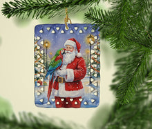 Load image into Gallery viewer, Green Winged Macaw Parrot with Santa Claus Porcelain Ornament